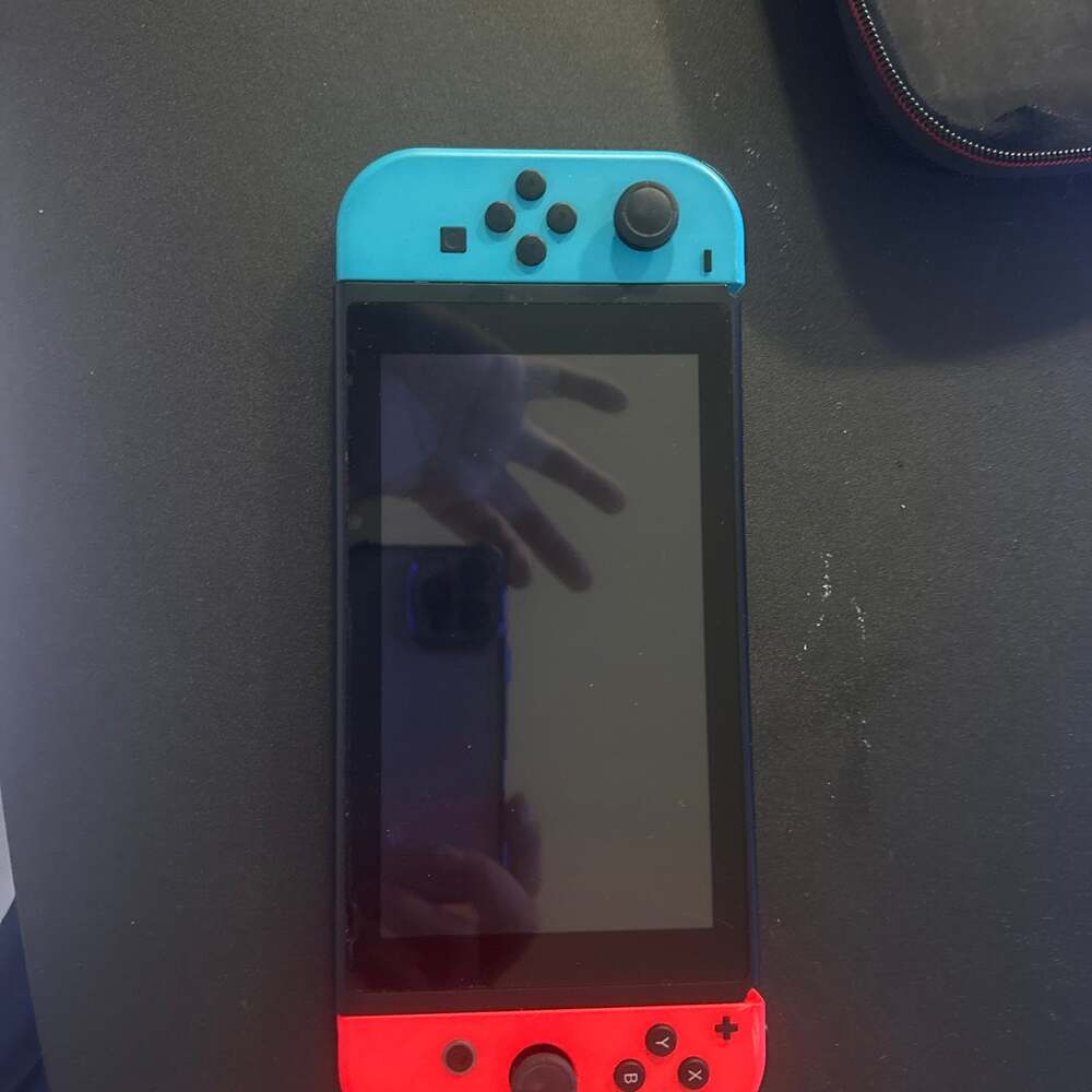 Nintendo Switch Console with Neon Blue and Neon Red Joy-Con